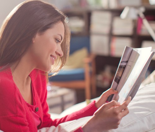 Woman reading magazine